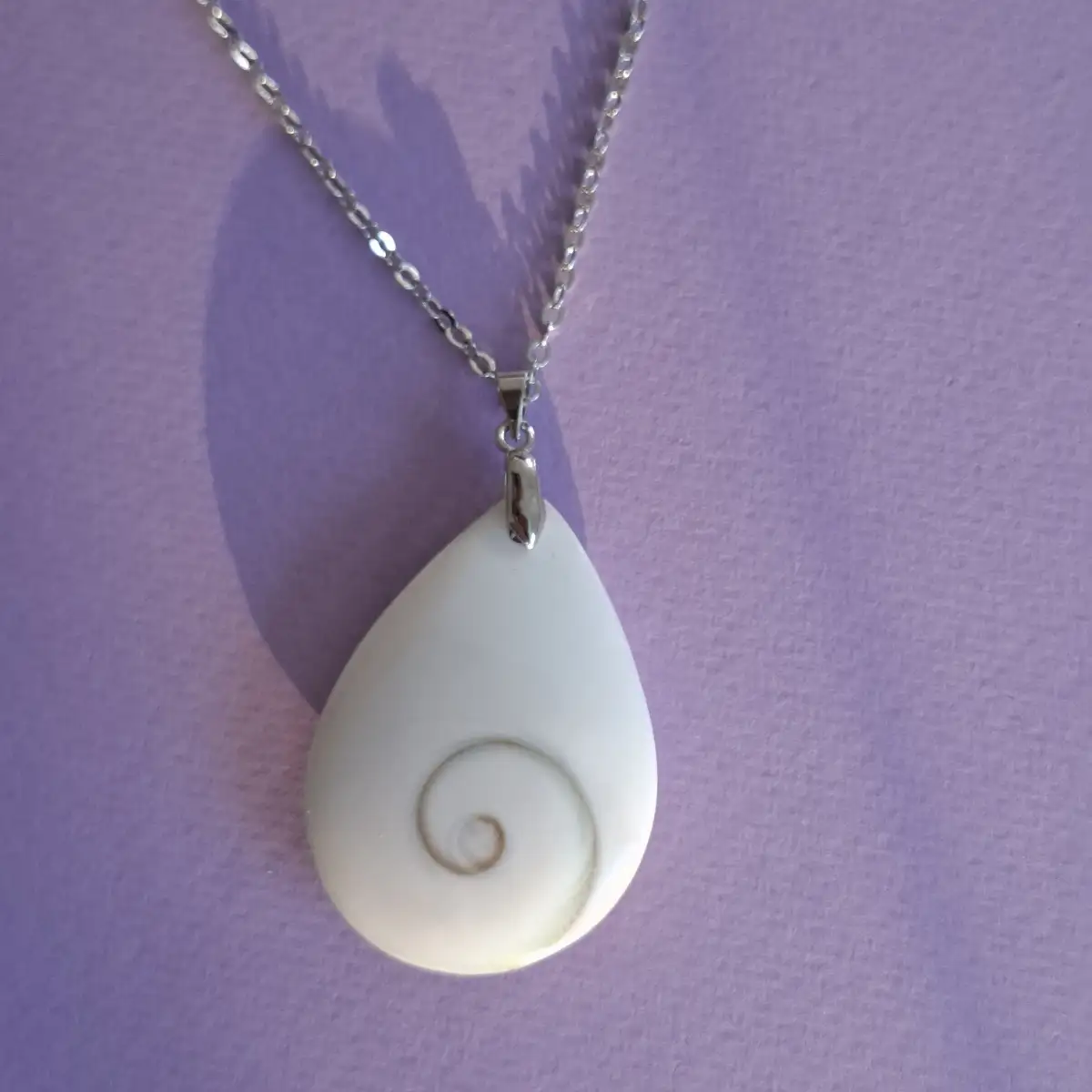 Pendentif en Œil de Sainte-Lucie naturel